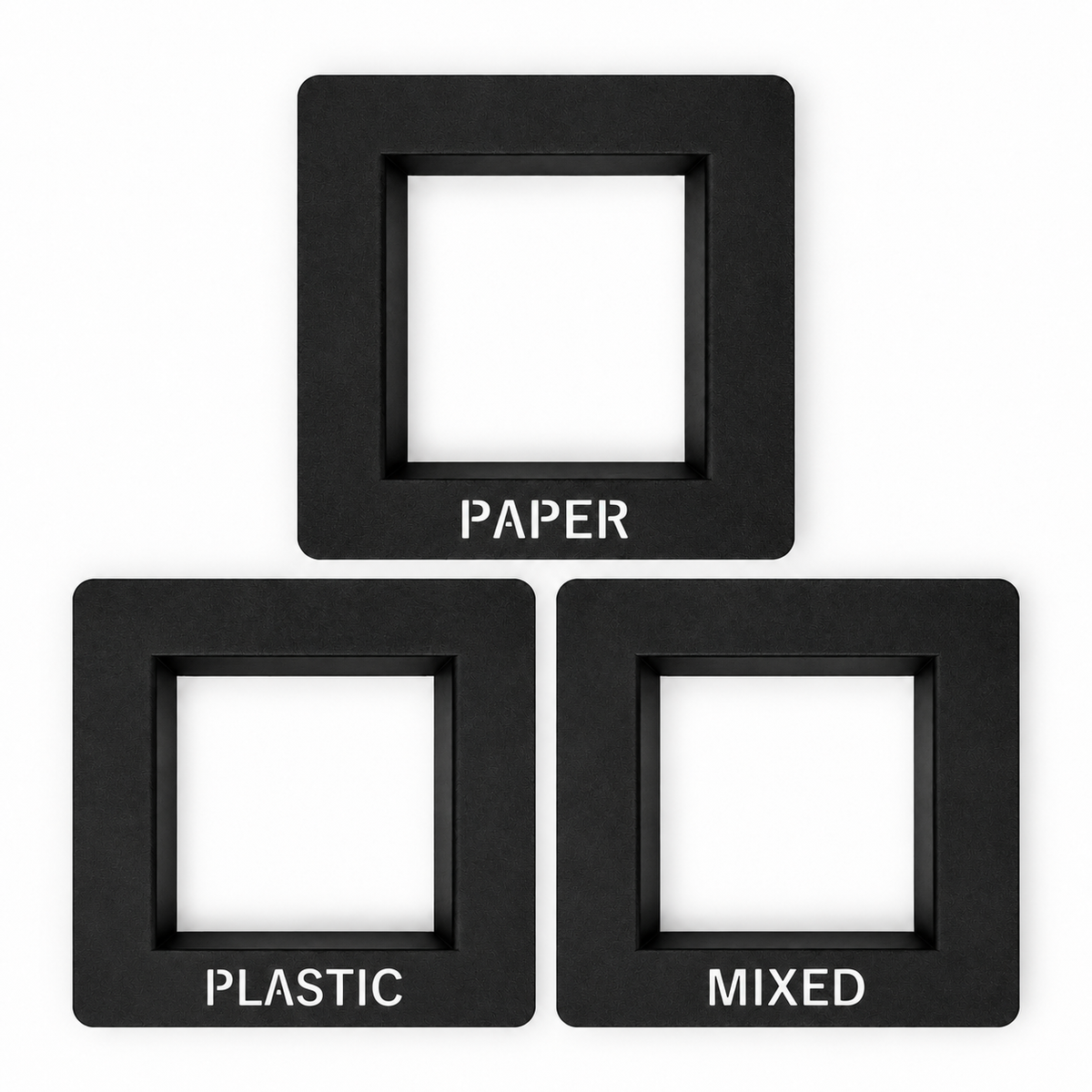 Set of three black countertop waste chute frames labeled PAPER, PLASTIC and MIXED